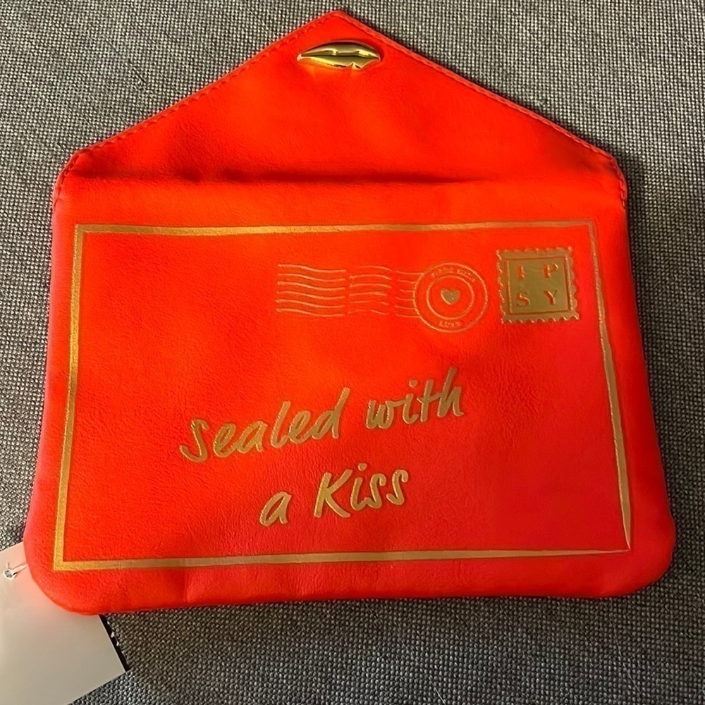 Ipsy red faux leather sealed with a kiss letter clutch